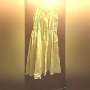 Yellow cotton (100% Cotton). Hourglass. V-neck. Sleeveless.